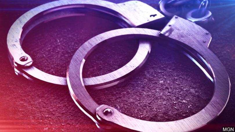 Officials arrest ex-student, saying lyrics threaten school