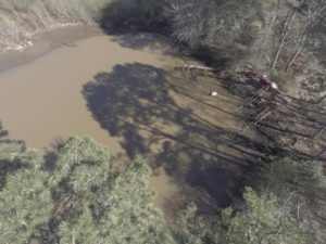 Investigation into body found in Neshoba County pond continues